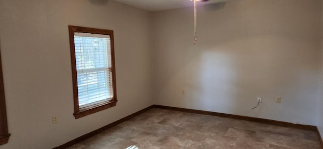 spare room featuring plenty of natural light