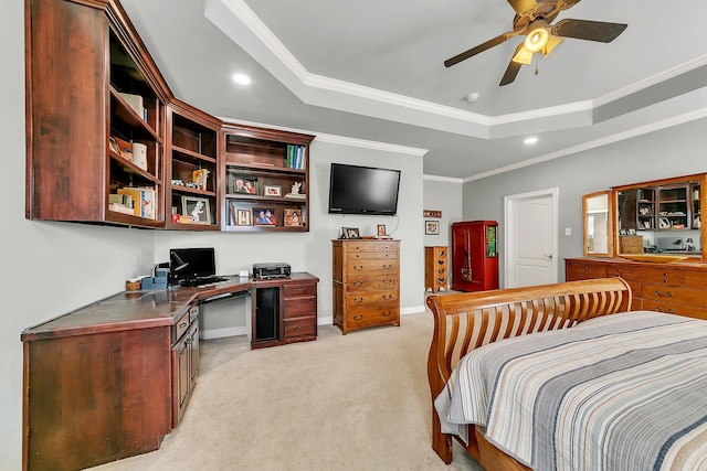 bedroom with recessed lighting, light carpet, baseboards, ornamental molding, and a tray ceiling