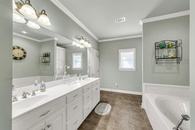 bathroom with plenty of natural light, a sink, visible vents, and tile patterned floors