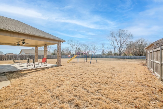 community playground featuring a patio area, a fenced backyard, and a ceiling fan