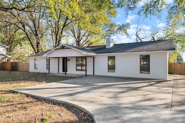 single story home with covered porch