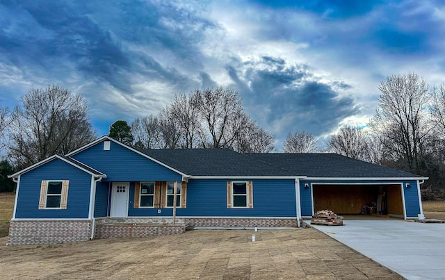 single story home with a garage