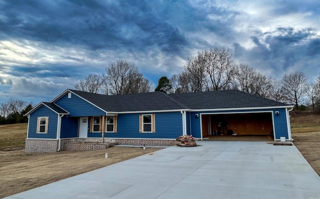 single story home featuring a garage