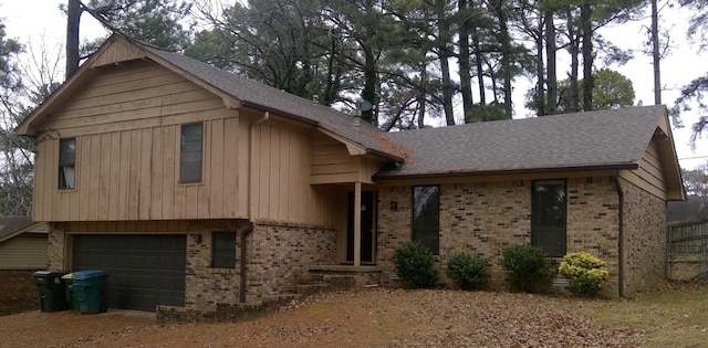 split level home featuring a garage