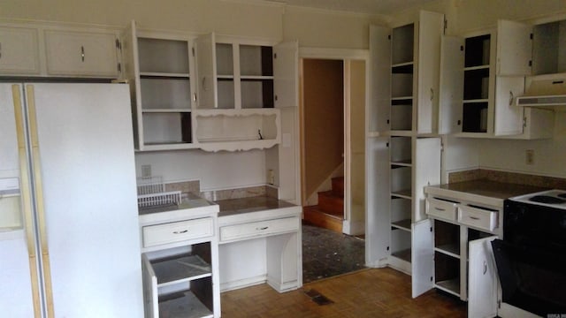 kitchen with white cabinetry, white fridge with ice dispenser, electric range, and dark parquet floors