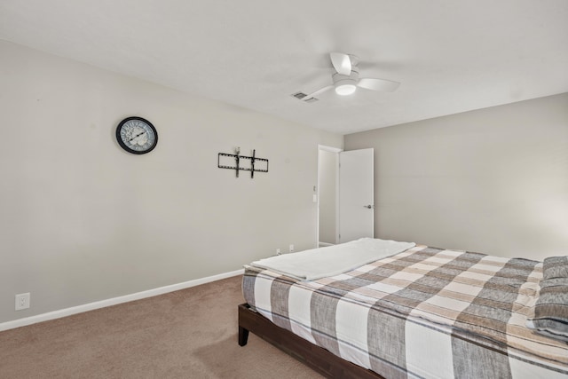 bedroom with ceiling fan and carpet floors