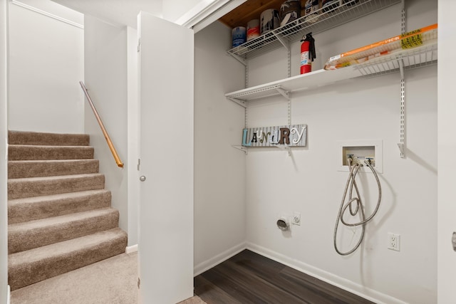 clothes washing area featuring washer hookup and hardwood / wood-style flooring