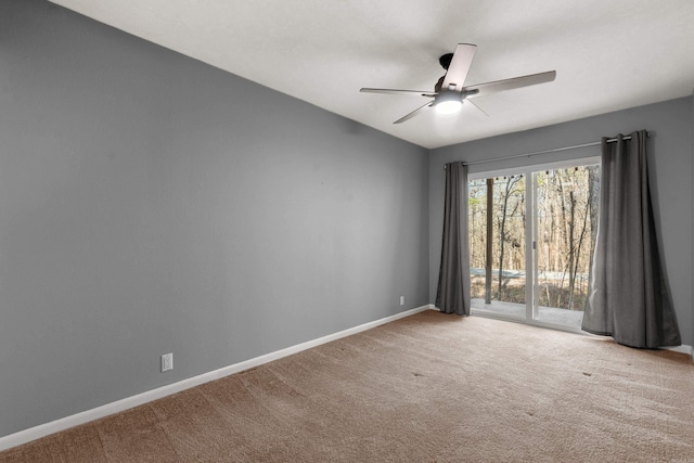 empty room with light carpet and ceiling fan