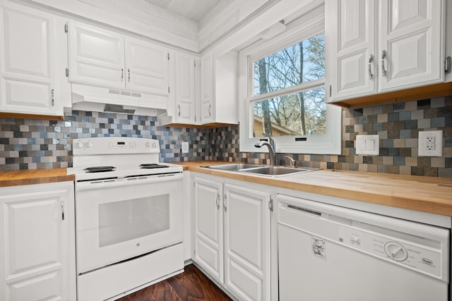 kitchen featuring white cabinetry, butcher block countertops, and white appliances