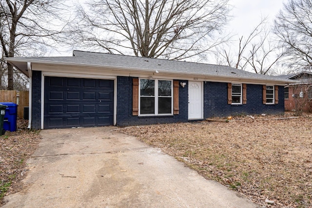 ranch-style home with a garage