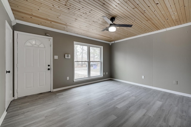 entryway with wood ceiling, ornamental molding, ceiling fan, and light wood-type flooring