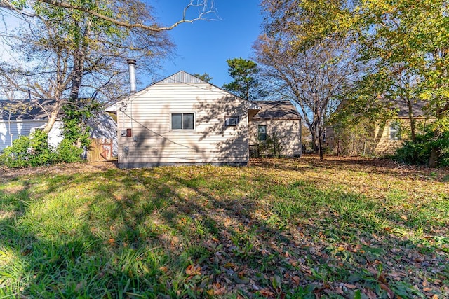 view of home's exterior featuring a lawn