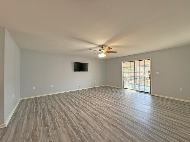 unfurnished room featuring wood-type flooring and ceiling fan