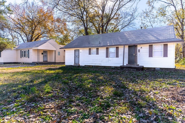 view of front of home with a front yard