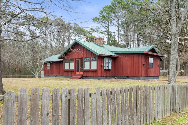 view of home's exterior featuring a yard