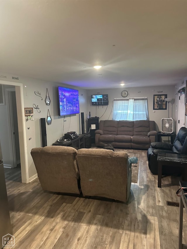 living room featuring wood-type flooring