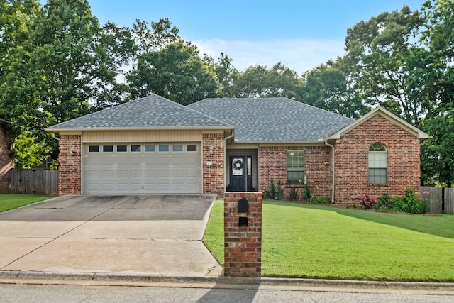 ranch-style house with a garage and a front yard