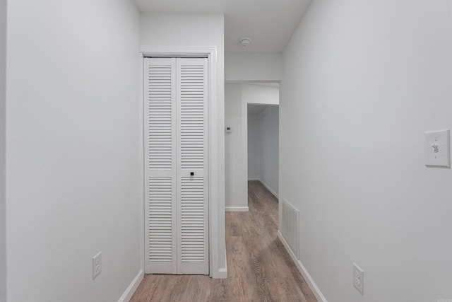 hallway featuring light wood-type flooring