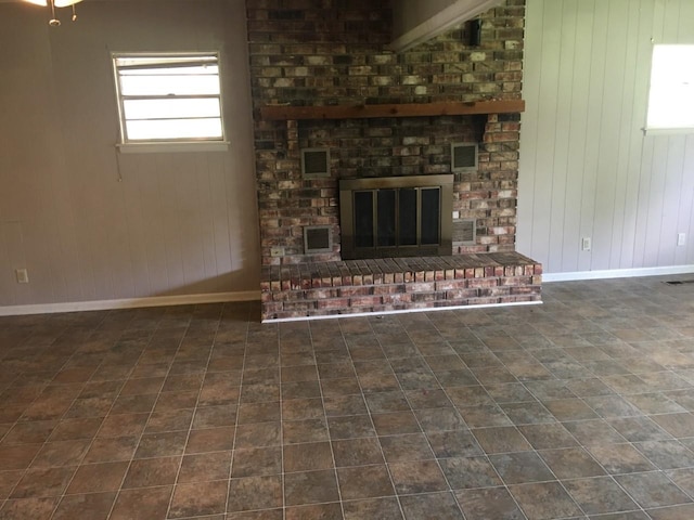 unfurnished living room with a fireplace