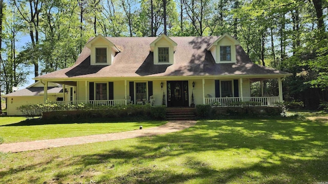 view of front of property featuring a porch and a front yard