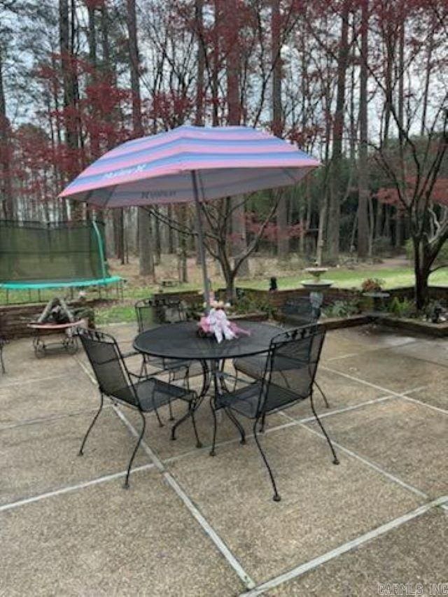 view of patio with a trampoline