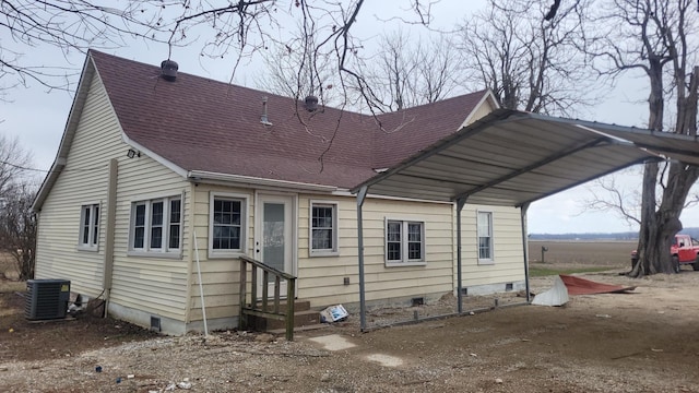 back of property with central AC unit