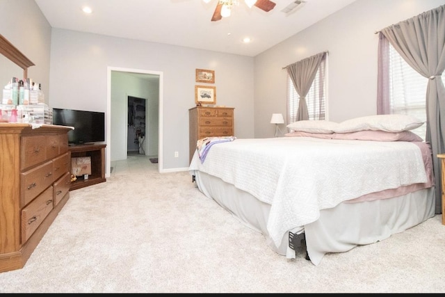 carpeted bedroom with ceiling fan