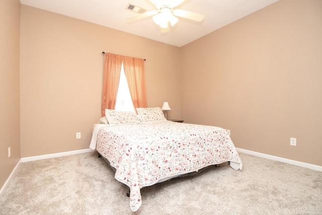 bedroom with ceiling fan and carpet