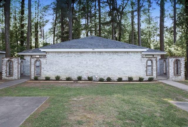 view of home's exterior featuring a lawn