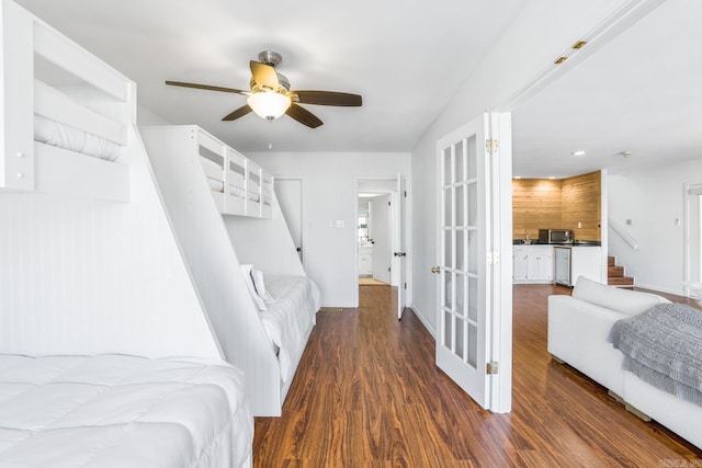 bedroom featuring dark wood-type flooring and ceiling fan