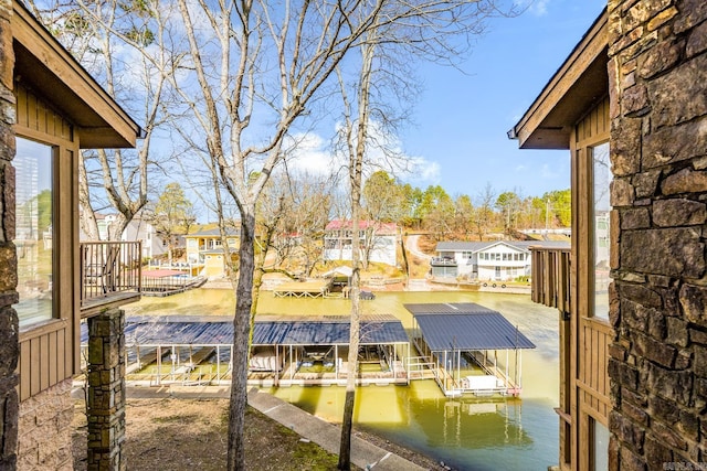 dock area with a water view