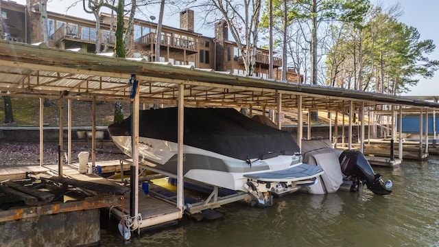 dock area with a water view