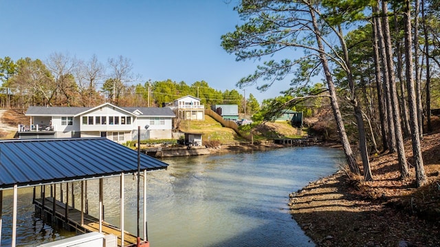 dock area with a water view