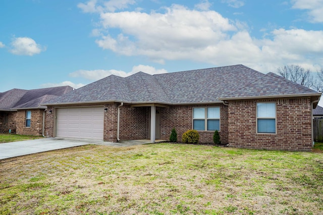 single story home with a garage and a front lawn