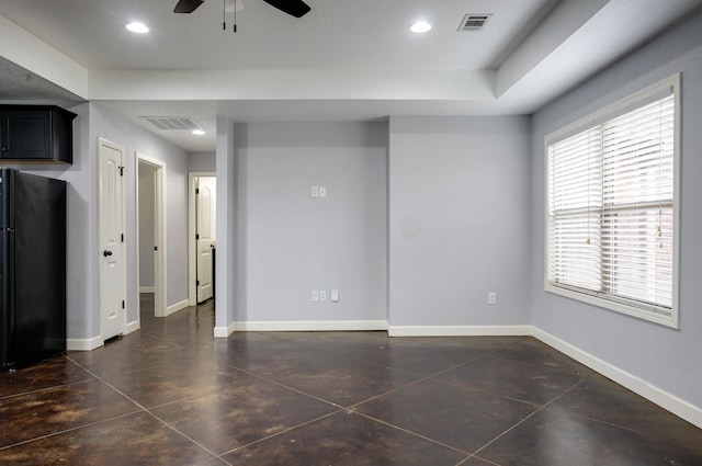 interior space with ceiling fan