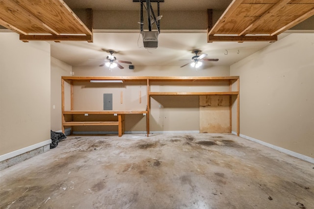 garage featuring a garage door opener and electric panel