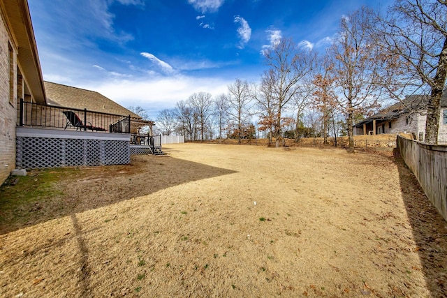 view of yard with a deck