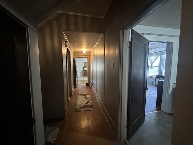 hallway featuring dark hardwood / wood-style floors