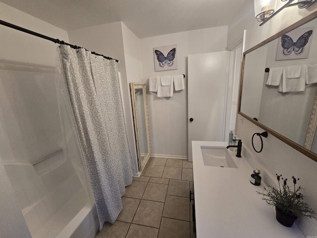 bathroom with vanity and tile patterned flooring