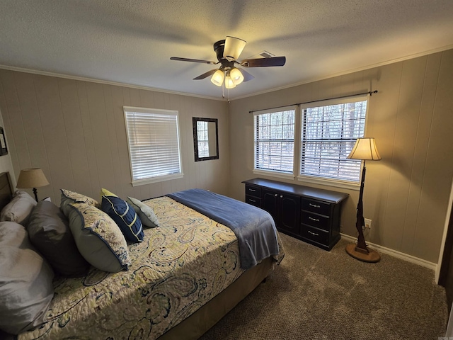 bedroom with crown molding, a textured ceiling, and dark colored carpet