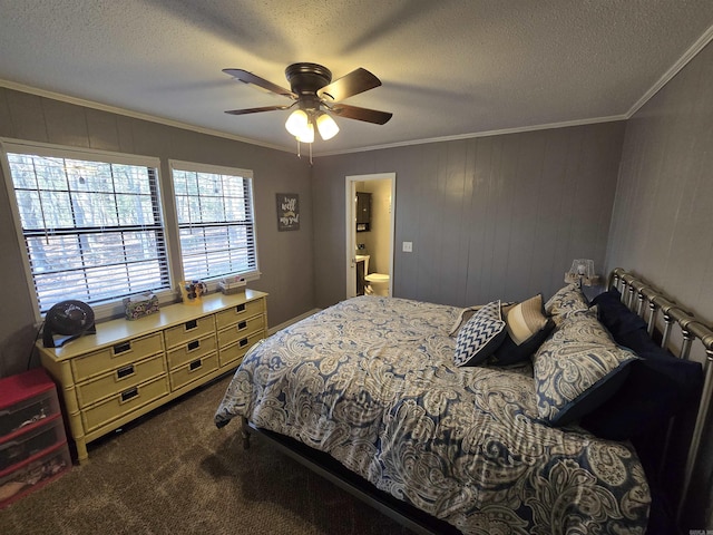 carpeted bedroom with crown molding, ceiling fan, connected bathroom, and a textured ceiling