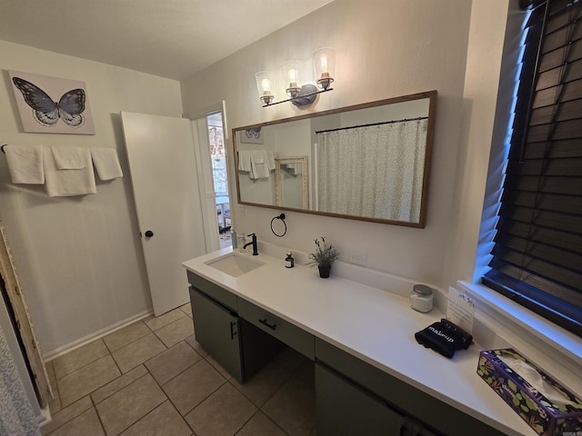 bathroom featuring tile patterned floors and vanity