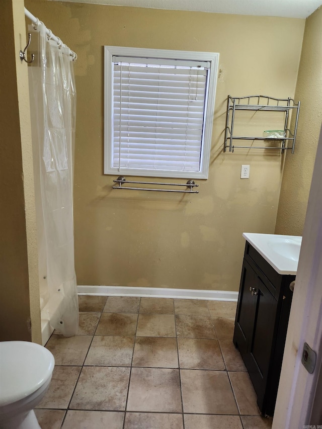 full bathroom featuring toilet, vanity, shower / bathtub combination with curtain, and tile patterned flooring