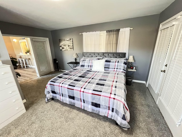 carpeted bedroom with a closet