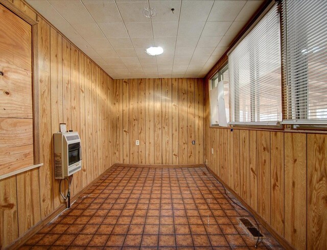 125 Hildreth, Hot Springs, AR 71913 - unfurnished room featuring heating unit and wood walls