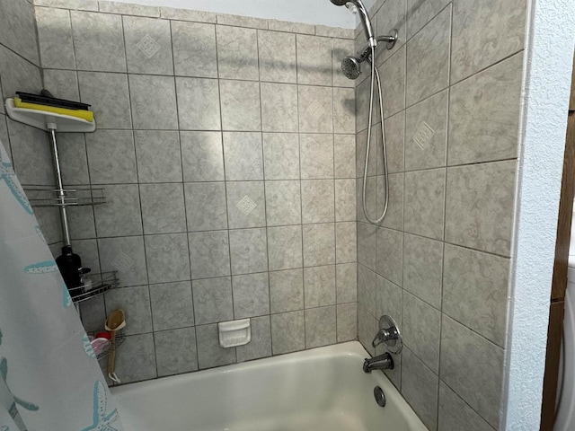 bathroom featuring shower / bath combination with curtain