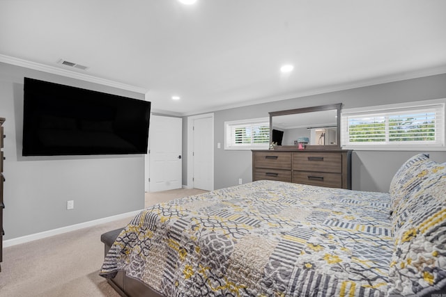 carpeted bedroom with ornamental molding