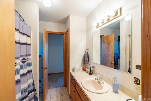 bathroom with vanity and tile patterned floors