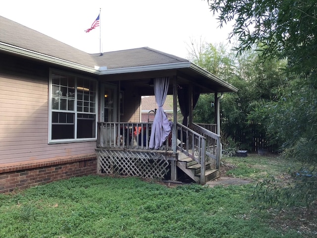 exterior space featuring a lawn