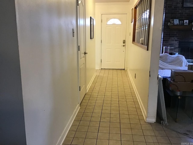 entryway featuring light tile patterned floors